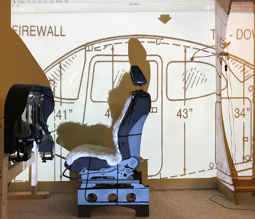Designing my first wooden cockpit. Real cockpit drawing projected onto wall to provide real dimensions and scale